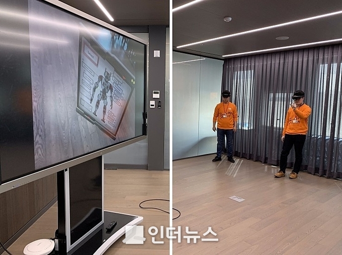 T 리얼 텔레프리즌스의 시연을 선보이는 SK텔레콤 직원들. Photo ⓒ 인더뉴스
