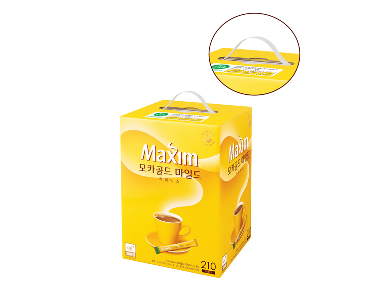 동서식품이 6월부터 맥심 커피믹스 대규격 제품에 종이 손잡이를 도입합니다. 이미지ㅣ동서식품