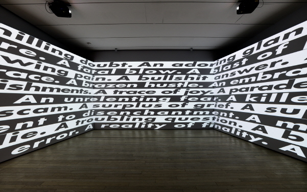 Barbara Kruger, Untitled (No Comment) (detail), 2020, Three-channel video installation, courtesy of Sprüth Magers and David Zwirner, New York, Installation photograph, in Barbara Kruger: Thinking of You . I Mean Me . I Mean You., Los Angeles County Museum of Art, 2022, art © Barbara Kruger, photo © Museum Associates/LACMA 