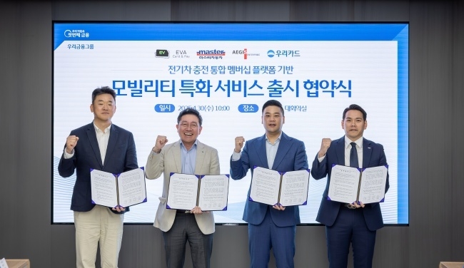 왼쪽부터 이원재 이지스엔터프라이즈 사장, 진성원 우리카드 사장, 곽동원 에바씨엔피 대표이사, 장은석 마스타자동차 대표. 사진ㅣ우리카드